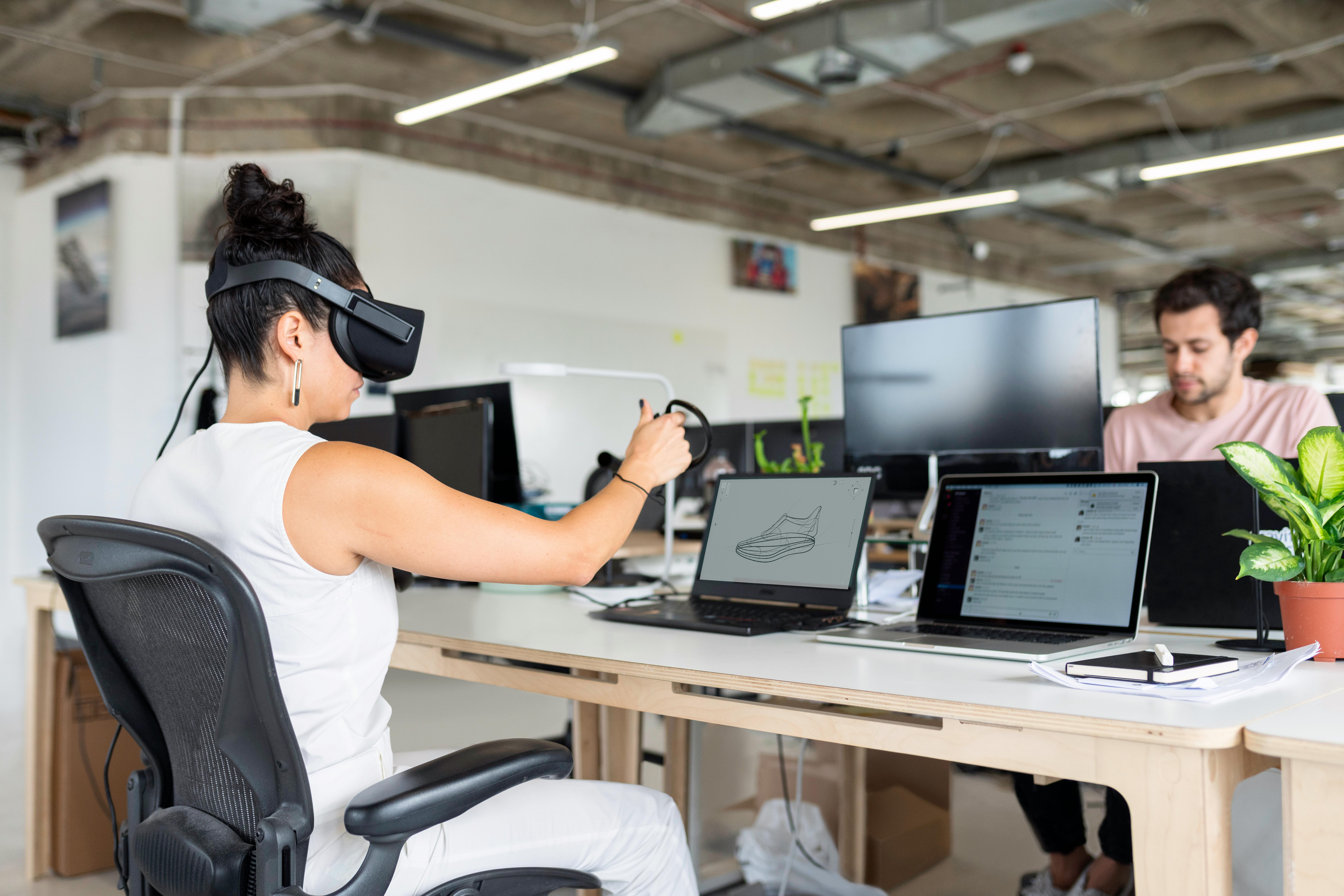 Home Woman using virtual reality headset in a modern office for design and innovation.